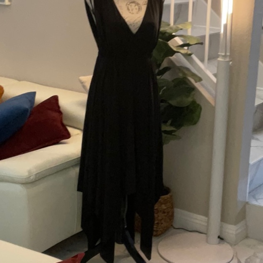 BCBGMAXAZRIA black dress with handkerchief skirt.  Size M
